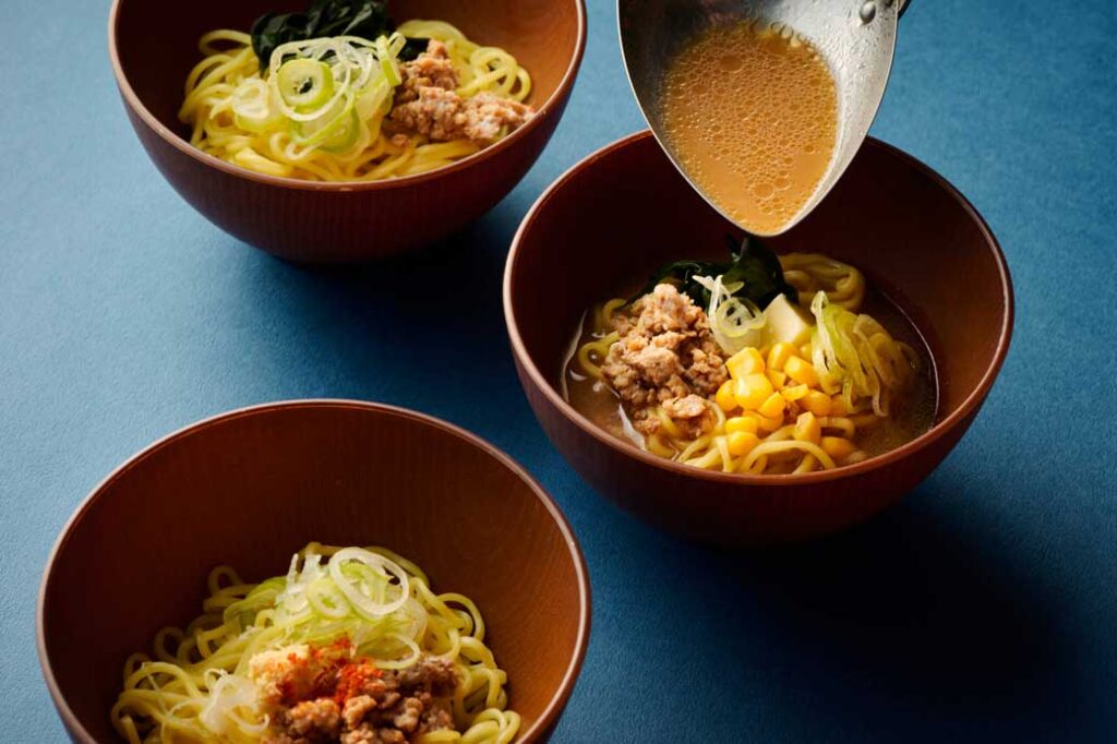 Hokkaido’s classic yellow curly noodles can be customized with daily‑changing soups.